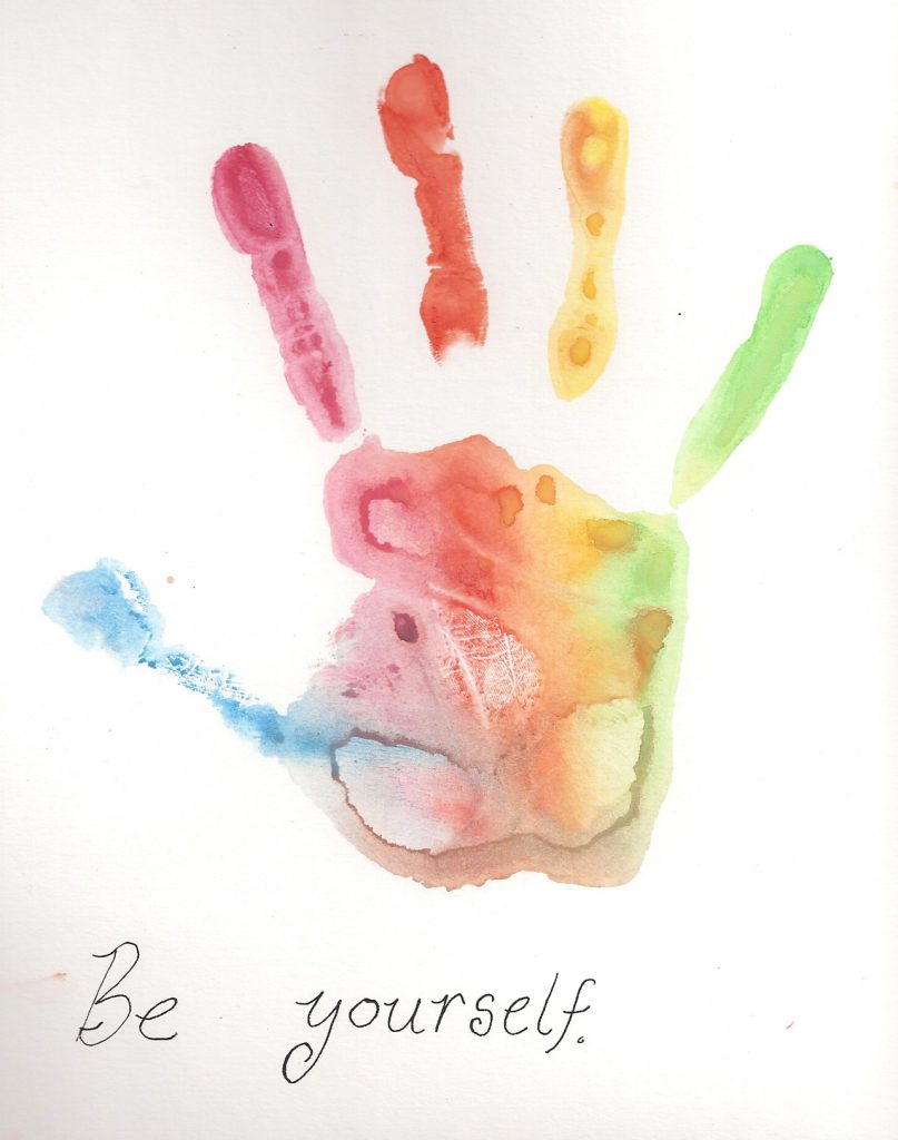 A multicoloured, watercolour handprint, with the words "Be yourself" written under it in cursive.